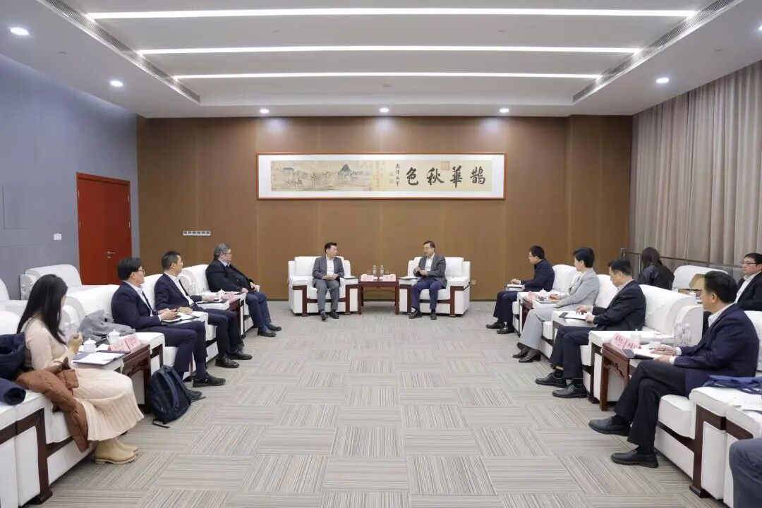 刘强会见新加坡客人